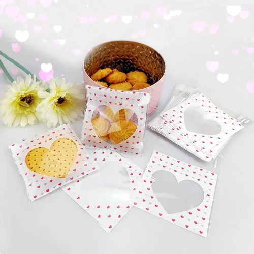 Vista 3 de SaktopDeco 100 bolsas pequeñas de celofán con corazón transparente, bolsas de regalo de San Valentín, bolsas de golosinas autosellantes