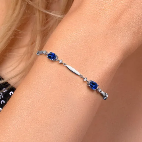 Vista 88 de Gem Stone King 925 Sterling Silver Gemstone Birthstone and White Created Sapphire Tennis Bracelet For Women Oval 7X5MM and 2MM 6 Inch + 1 Inch