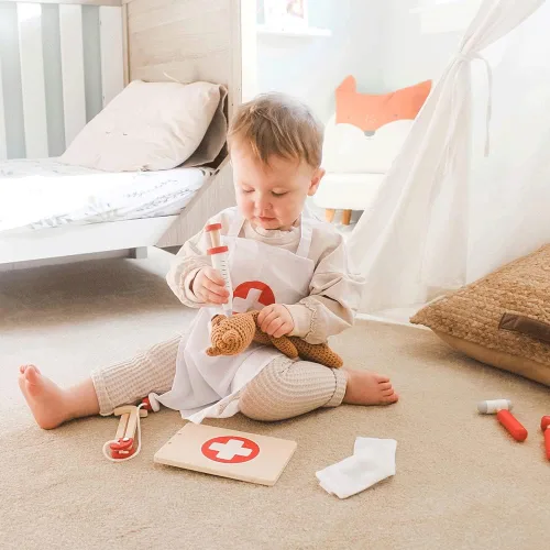 Vista 8 de Bigjigs Toys Juego de médicos para niños, juego de médicos de madera de 10 piezas con estetoscopio para niños, termómetro, medicina y más en estuche