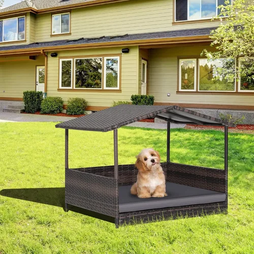 Vista 2 de Tangkula Casa de mimbre para perros, cama elevada de ratán para interiores y exteriores con cojín extraíble, funda lavable, techo impermeable
