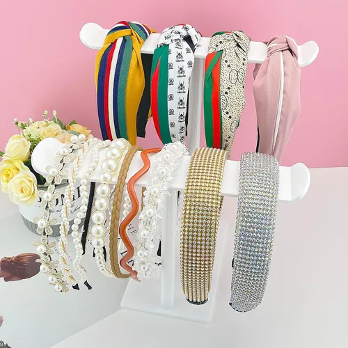Vista 2 de Soporte para diadema, soporte organizador de diadema acrílica, almacenamiento de accesorios para el cabello (2 niveles y 2 paneles)