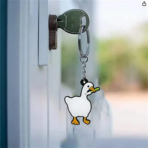 Vista 2 de Lindo llavero de dibujos animados de animales de ganso blanco llavero de coche llavero para mujeres hombres niños llaves accesorios bolso mochila