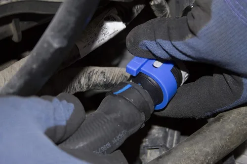 Vista 4 de Lisle 39200 Desconexión de manguera de calentador para Ford 2.0L, azul