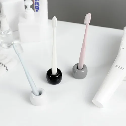 Vista 5 de Mini soporte de cerámica para cepillos de dientes para parejas, soporte para cepillos de dientes de baño hecho a mano, soporte para cabezal