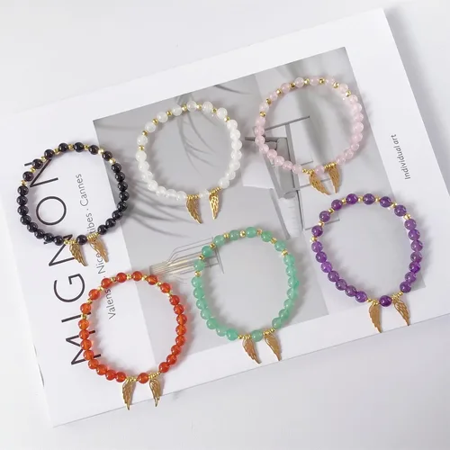 Vista 4 de EDEN'S CALL Pulsera de cuentas de cristal curativo con alas de ángel, pulsera elástica con cuentas de cuarzo para mujer