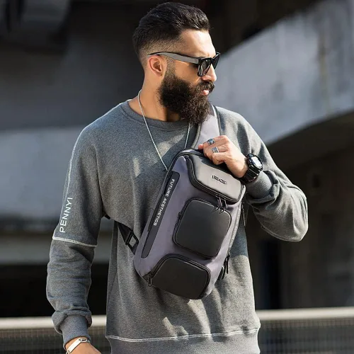 Vista 7 de Mochila tipo bandolera para hombre, bolsa de hombro impermeable con puerto USB