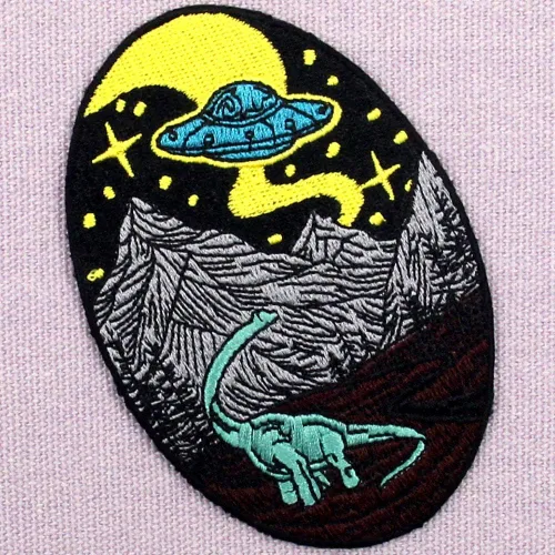 Vista 3 de ZEGINs Parche bordado de dinosaurio y alienígena con apliques para coser en emblema
