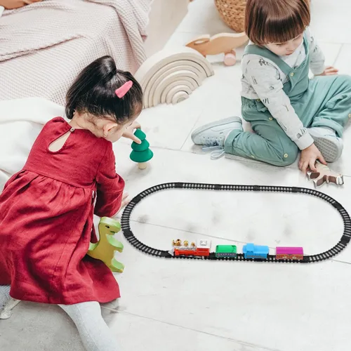 Vista 4 de Juego de tren eléctrico navideño para pista de ferrocarril de plástico y maleta portátil, superficie lisa segura para niños y colores brillantes que