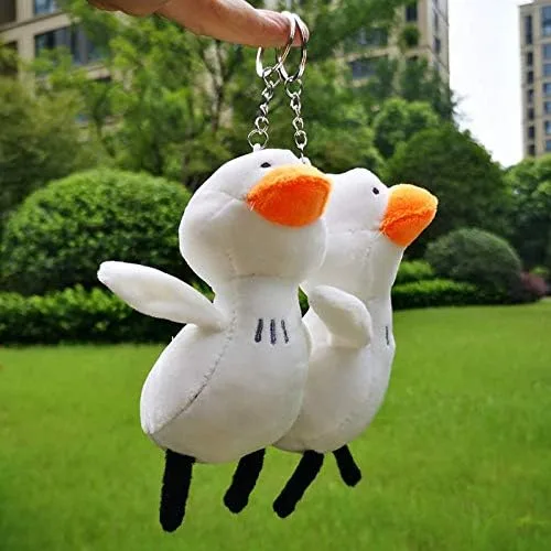Vista 4 de HSYHERE Llavero de pato blanco de felpa de energía positiva súper lindo para hombres, mujeres, niños y niñas, llavero de pato de buena suerte
