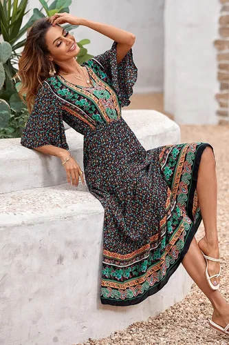Vista 4 de PRETTYGARDEN - Vestido casual de playa y de verano para mujer de estilo bohemio manga corta cuello en V y con estampado floral maxi vestidos largos