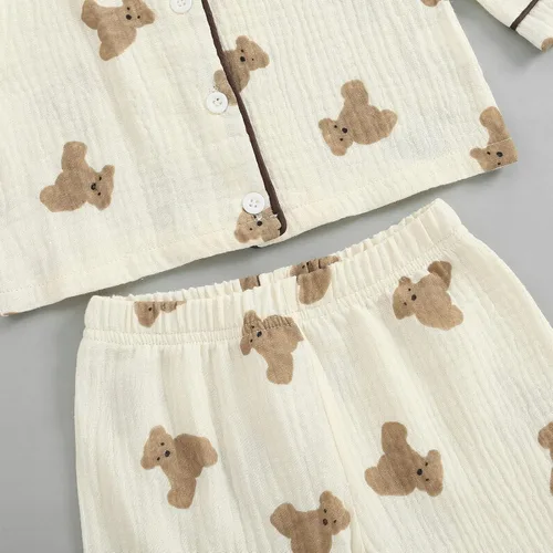 Vista 5 de BULINGNA - Juego de pijama de dos piezas para niños, niño y niña, con botones, camiseta y pantalones cortos con diseño de oso, ropa de dormir