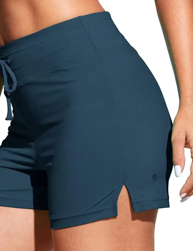Vista 4 de CRZ YOGA Pantalones cortos de natación para mujer de 4 pulgadas, forro de malla, cintura alta, pantalones cortos deportivos con abertura lateral