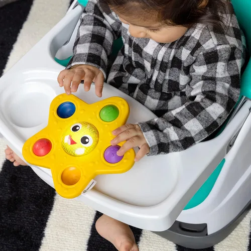 Vista 3 de Baby Einstein Exploradores Oceánicos Estrella Brillante y Pop, Estrella de Mar Sensorial Iluminada, Juguete de Succión para Silla Alta, para Bebés