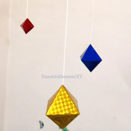 Vista 8 de Láser brillante octaédrico móvil bebé juguete brillante y brillante Montessori móvil con materiales respetuosos con el medio ambiente del bebé