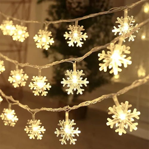 Vista 7 de Luces de Navidad, 20 pies, tira de 40 luces led con forma de copo de nieve, azules, funciona con pilas, guirnalda de luces para dormitorio, patio