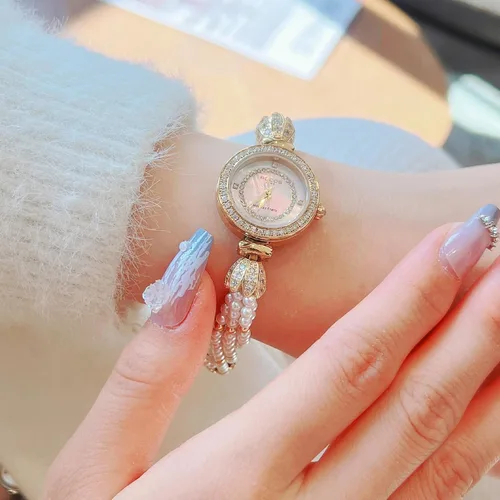 Vista 6 de Reloj de pulsera de oro para mujer, correa de cadena de perlas giratoria, esfera deslumbrante, impermeable, regalo para mujer R0262JF