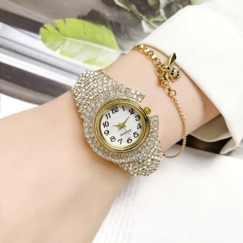 Vista 2 de Reloj de pulsera elegante de cristal para mujer, brazalete redondo, esfera analógica de cuarzo Dorado