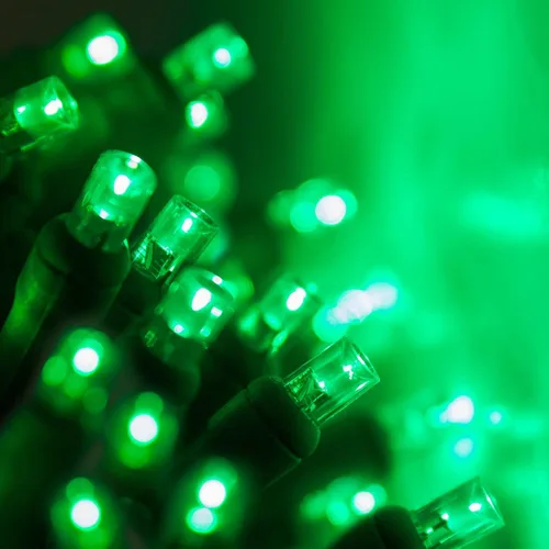 Vista 9 de Wintergreen Lighting 50 bombillas LED de Navidad de luz blanca cálida, 5,2 m de cable verde para interiores y exteriores, grado comercial, mini