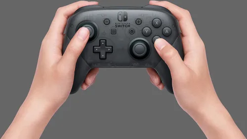 Vista 4 de Nintendo Switch Pro Controller with Super Mario Odyssey Full Game Download Code