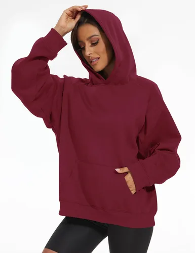Vista 6 de Lauweion - Sudadera básica lisa de ajuste holgado con forro polar, capucha, mangas largas, hombro caído y bolsillo tipo canguro para mujer
