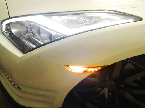 Vista 4 de iJDMTOY JDM - Kit de luz de marcador lateral frontal 3D ámbar transparente compatible con Nissan GT-R 2007 en adelante, alimentado por 30 diodos