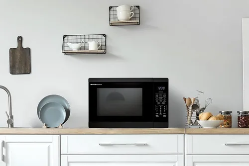 Vista 7 de SHARP Horno microondas para encimera con plato giratorio extraíble de 12.4 pulgadas, 1100 vatios, 1.4 pies cúbicos, color negro