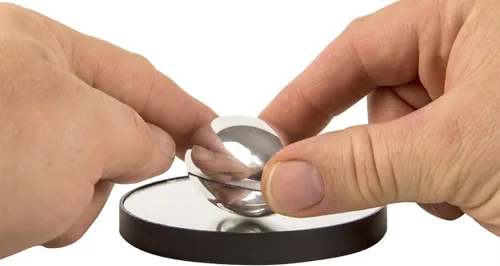 Vista 2 de PhiTOP trompo elipsoide para aliviar el estrés. Maravilla de la fisica y la óptica