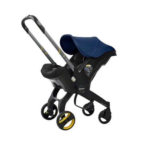 Vista 10 de Doona - Asiento de automóvil y cochecito, Azul profundo - Sistema de viaje todo en uno