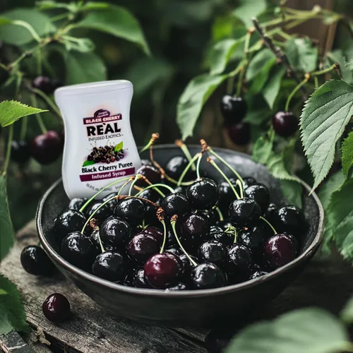 Vista 4 de Black Cherry Reàl - Jarabe con infusión de puré de cereza negra, botella exprimible de 16.9 onzas líquidas (paquete de 3) Intense Cherry Zing