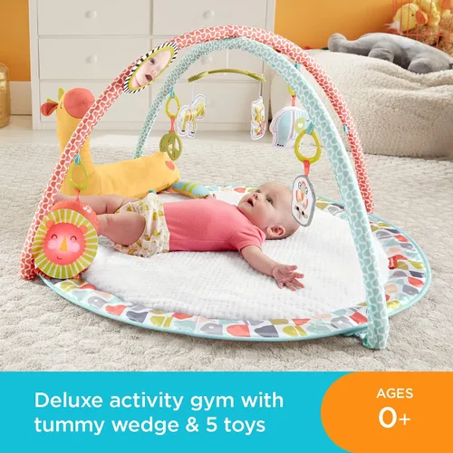 Vista 2 de Fisher-Price Go Wild Gym & Giraffe Wedge, gimnasio de actividades infantiles con gran alfombra de juego, juguete musical y cuña de apoyo