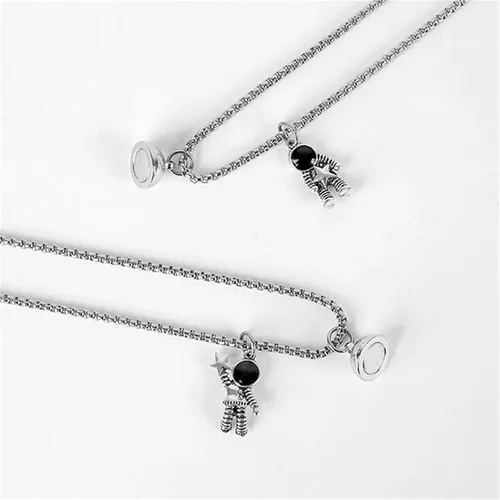 Vista 4 de Caiyao 2 imanes de atracción mutua de acero inoxidable para parejas, collar magnético de promesa de astronauta para mujeres, hombres, amigos, él