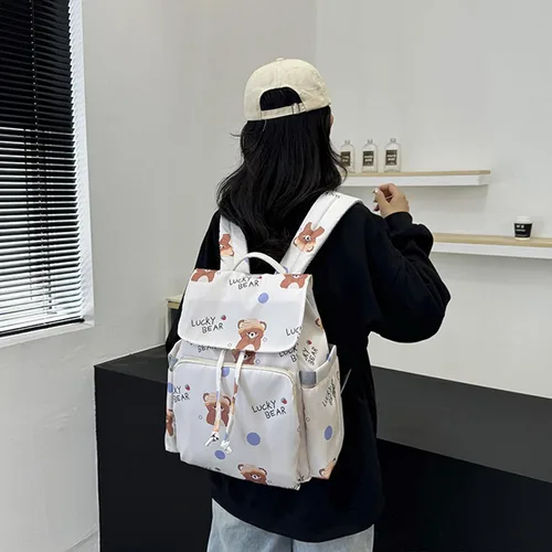 Vista 7 de Bolsa organizadora de pañales compacta con asa de fácil transporte, correa ajustable, mochila multiusos para madres ocupadas, estampado de oso