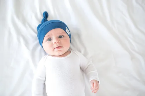 Vista 23 de Copper Pearl - gorro de bebé con nudo superior elástico suave