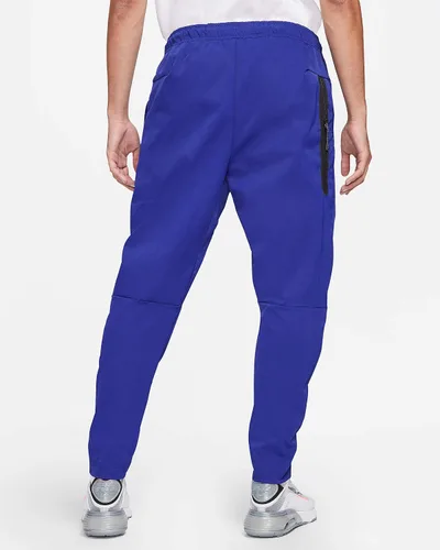 Vista 2 de Nike Ropa deportiva NSW - Pantalones para hombre tejidos cónicos ligeros CU4483-455 talla M, azul rey intensonegro , Mediana