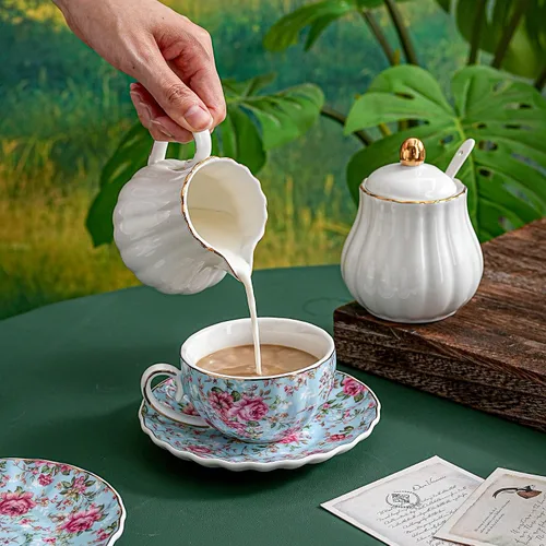 Vista 5 de Agyiuns Taza de té y platillos, tazas de té floral de 6.4 onzas con borde dorado, taza de té de porcelana, tazas de café capuchino espresso con Azul