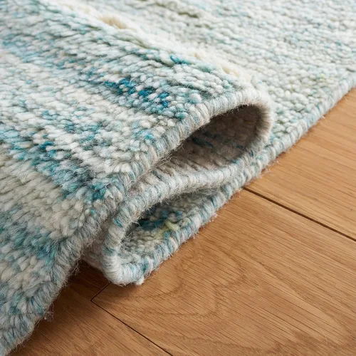 Vista 4 de SAFAVIEH Casablanca Shag Collection - Alfombra decorativa, 2 pies 3 pulgadas x 5 pies, turquesa y marfil, lana maciza hecha a mano, ideal para sala