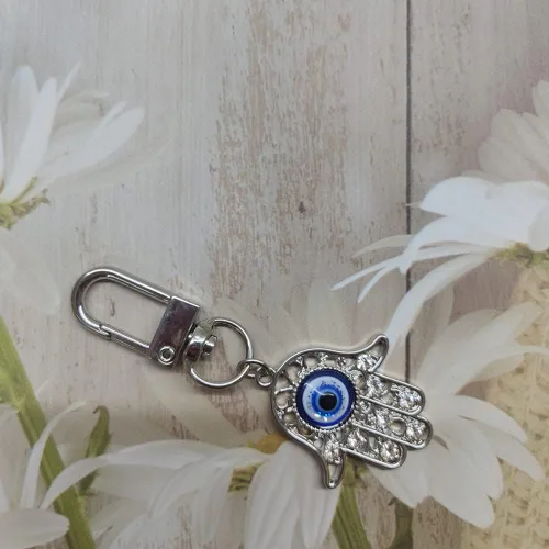 Vista 3 de Llavero Hamsa de cristal de ojo malvado, dije de diamantes de imitación, llavero de mano de Fátima para bolso y monedero con clip, adorno