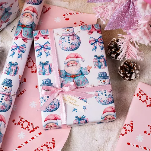 Vista 3 de Homeral Rollo de papel de regalo de Navidad, Papá Noel, muñeco de nieve y lazo y bastones de caramelo rosados, envoltura de regalo reversible