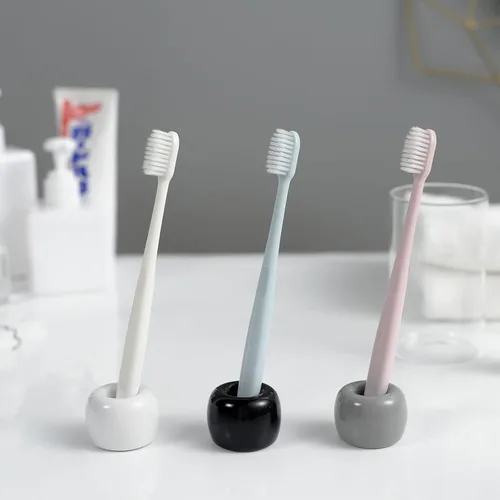 Vista 6 de Mini soporte de cerámica para cepillos de dientes para parejas, soporte para cepillos de dientes de baño hecho a mano, soporte para cabezal