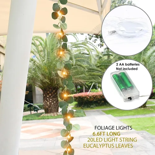 Vista 4 de Guirnalda de luces de follaje de hojas de eucalipto artificiales, 6.6 pies, 20 luces LED de hojas de hadas, guirnalda de vides verdes blancas