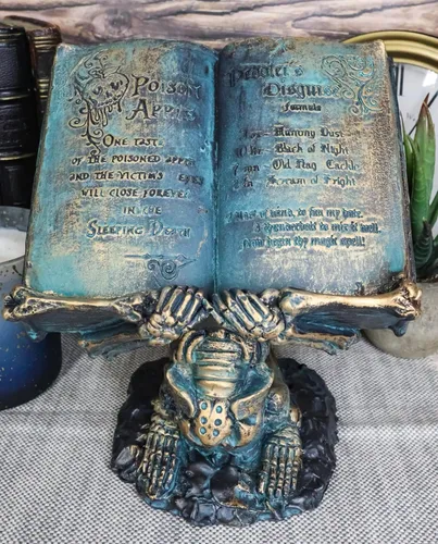 Vista 2 de Ebros Gift Alquimia gótica Esqueleto de la maldición del hombre muerto Esclavo sosteniendo una bruja veneno libro de hechizos de manzana en su