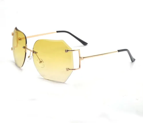 Vista 4 de lentes de sol sin montura de tamaño grande con lentes transparentes para mujer.