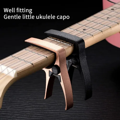 Vista 3 de Cejilla de ukelele para guitarra de 4 cuerdas y mandolina, cejilla profesional para ukelele de tamaño mini (Negro)