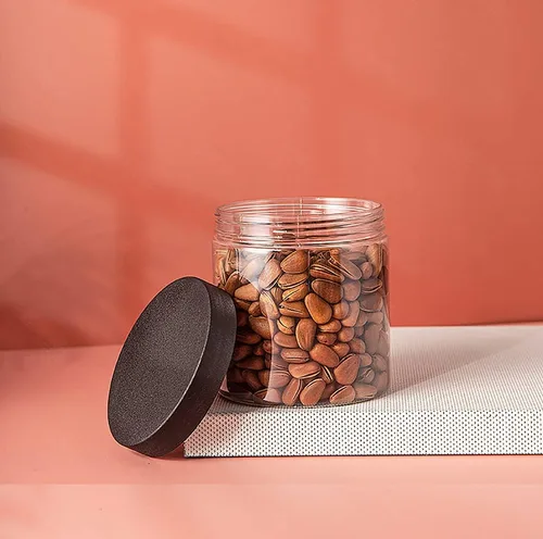 Vista 5 de Lawei Paquete de 12 tarros de plástico con tapas, tarros de almacenamiento transparentes de 16 onzas con tapas de rosca negras, recipientes redondos