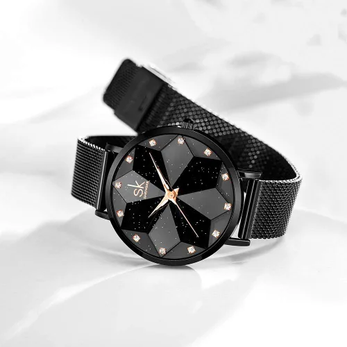 Vista 3 de SK Shengke - Reloj ultra delgado de creativo diseño minimalista floral o de cielo estrellado con extensibles de piel genuina o acero