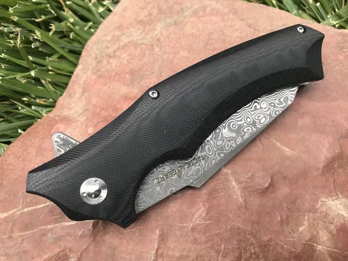 Vista 4 de TACTICAL GEARZ Cuchillo de bolsillo de acero de Damasco, cuchillo plegable EDC con mango G10, cuchillo de transporte diario de hoja de damasco de 67