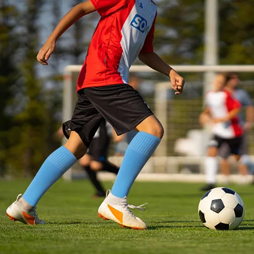 Vista 3 de Raigoo Calcetines de fútbol para niños (4 a 16 años), calcetines deportivos hasta la rodilla para niños y niñas