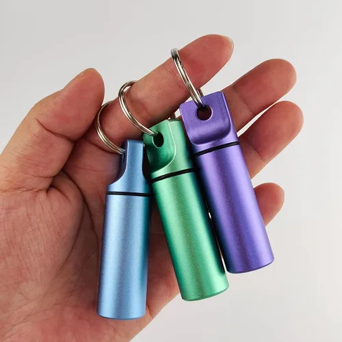 Vista 6 de Pequeña caja organizadora de píldoras, portapíldoras impermeable con llavero, contenedor portátil de píldoras para viaje, estuche de metal