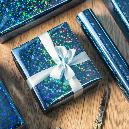 Vista 7 de Merture - Rollo de papel de regalo holográfico azul, papel de regalo azul con diseño de galaxia brillante para cumpleaños, baby shower, Navidad, día