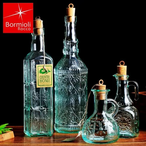 Vista 7 de Bormioli Rocco Juego de 2 botellas Country Home Fiesole de 24 onzas con tapa de corcho natural, cristal de estrella teñido azul-verde, diseño